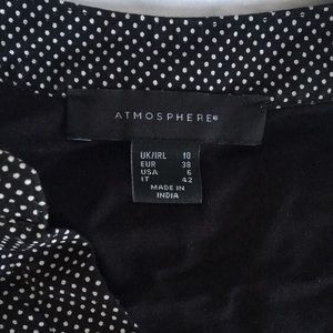 Pullover dress shirt.